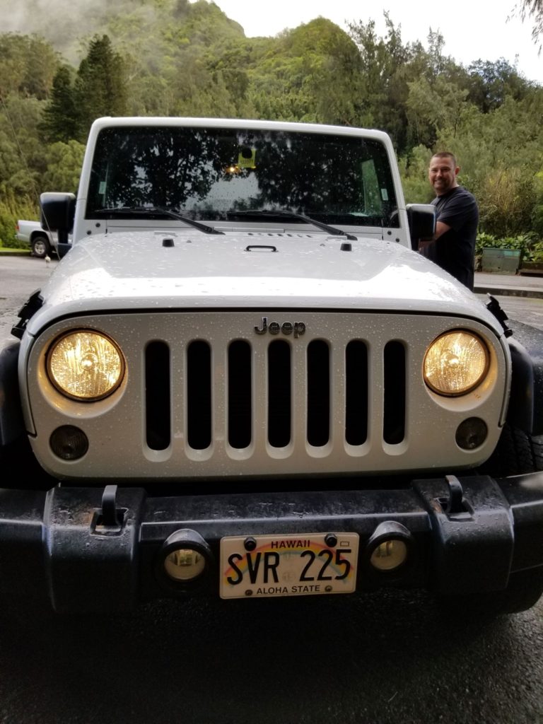 Driving around Oahu in one day with this Jeep.