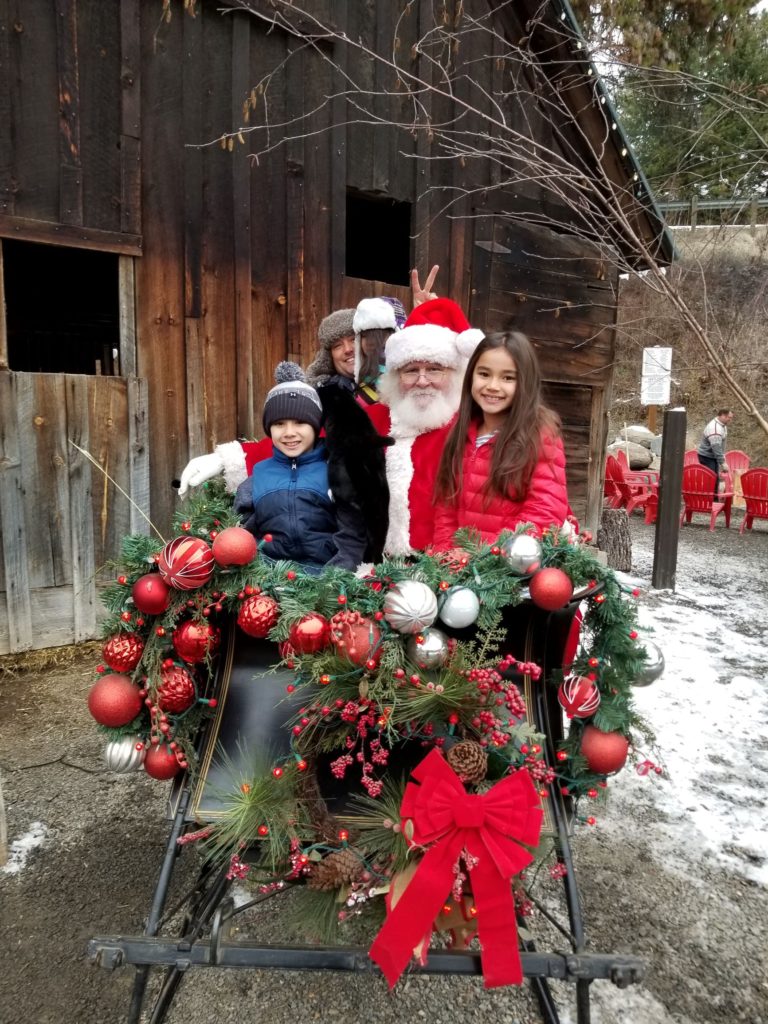 santa photos during a december visit at the leavenworth reindeer farm